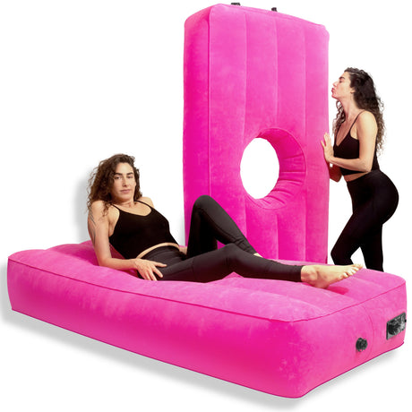 Pink Yesindeed inflatable BBL mattress with a circular opening shown in the product photograph