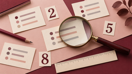 Loose numerals, source cards, a ruler and magnifying glass illustrating the need for context around numerical claims